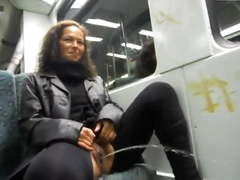 Crazy brunette piss in the train